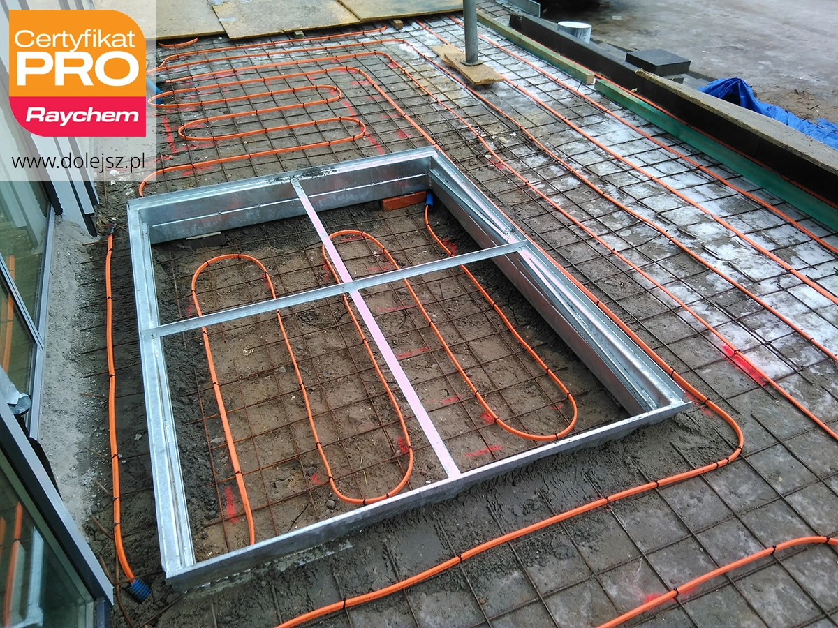 Elektryczne ogrzewanie schodów, ramp i stref wejściowych do sklepu - Warszawa