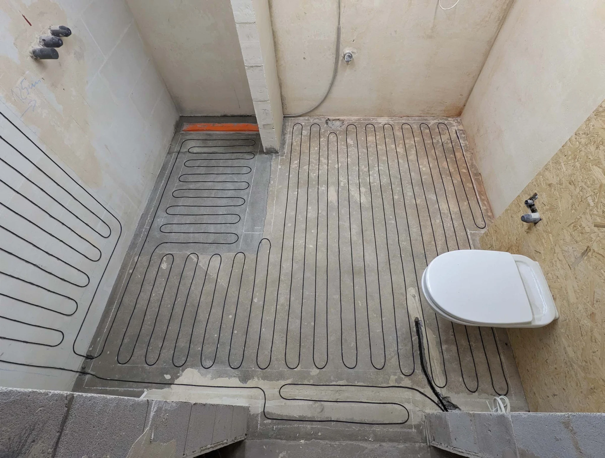 Elektryczne ogrzewanie podłogowe w łazience montaż Warszawa